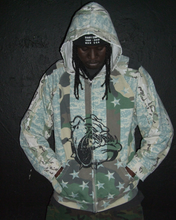 Load image into Gallery viewer, DIARY CAMO CONSTRUCTED FRENCH TERRY RAGLAN ZIP HOODIE
